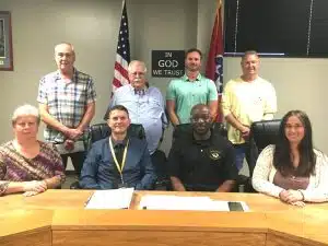 DeKalb Board of Education: Pictured seated left to right: Secretary Jamie Vickers, Director of Schools Patrick Cripps, Shaun Tubbs and Megan Moore. Back row standing left to right: Alan Hayes, Danny Parkerson, Jason Miller, and Jim Beshearse. Eric Ervin (not pictured)