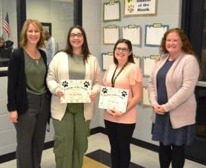 Standing left to right are Principal Sabrina Farler, August Employee of the Month Riley Patterson, August Teacher of the Month Leslie Moore, and Assistant Principal Cindy Snow.