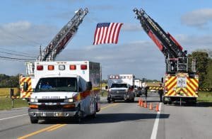 Firefighters, EMS, law enforcement and other first responders and public safety agencies in emergency vehicles (including many ambulances and fire trucks) locally and across the mid-state formed a very long procession Wednesday afternoon to escort the body of DeKalb EMS Director and Smithville Fire Department Deputy Chief Hoyte Hale to his final resting place at DeKalb Memorial Gardens.