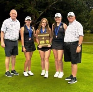 The Lady Tiger golfers, Alison Poss, Chloe Boyd, and Emily Anderson, on Monday, September 30 won the AA Region 4 Golf Tournament by 26 strokes over their nearest competitor. Pictured left to right: Assistant Golf Coach Luke Dycus, Chloe Boyd, Alison Poss, Emily Anderson, and Head Coach John Pryor