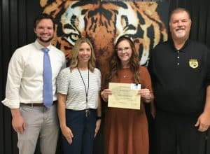 The September Teacher of the Month award at DeKalb County High School goes to Lauren Ferrell. Pictured left to right are DCHS Assistant Principals Seth Willoughy and Jenny Norris, Teacher of the Month Lauren Ferrell, and DCHS Principal Bruce Curtis