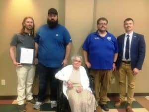 A resolution in memory of the late DeKalb EMS Director Hoyte Hale was adopted by the county commission Monday night. County Mayor Matt Adcock presented a copy of the resolution to Mr. Hale’s family. Pictured left to right are Hale’s sons Devin and Quentin Hale , his mother Margaret Hale along with the newly appointed EMS Director Trent Phipps and County Mayor Matt Adcock