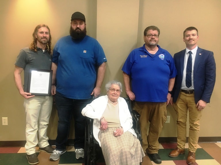  A resolution in memory of the late DeKalb EMS Director Hoyte Hale was adopted by the county commission Monday night. County Mayor Matt Adcock presented a copy of the resolution to Mr. Hale’s family. Pictured left to right are Hale’s sons Devin and Quentin Hale , his mother Margaret Hale along with the newly appointed EMS Director Trent Phipps and County Mayor Matt Adcock