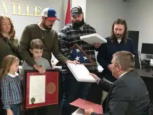 Another tribute to the late Hoyte Hale. State Representative Michael Hale presented members of Hoyte’s family a framed copy of a proclamation in honor of Hale adopted by the State House as well as flags flown over the state capital.