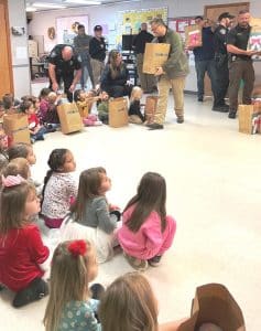 The Smithville Police Department Tuesday brought some extra holiday cheer to the youngsters by delivering toys purchased with donations to all the kids at Smithville Head Start