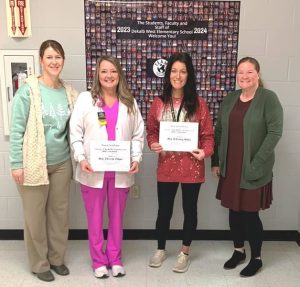 Picture caption: Pictured left to right are Principal Sabrina Farler, Employee of the Month Christie Driver, Teacher of the Month Whitney Brelje, and Assistant Principal Cindy Snow.