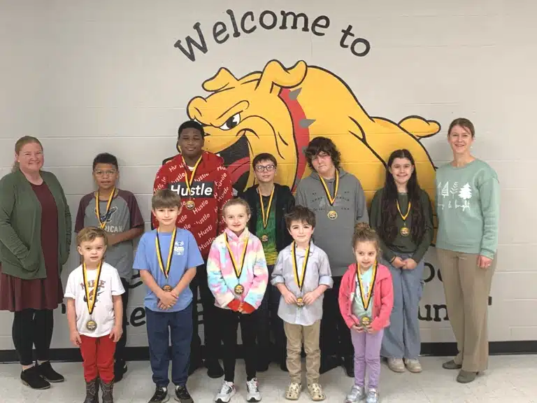 DWS Students of the Month: Photo Caption 1st row left to right are Dakota Anderson, Aiden Checchi, Tillie Stanley, Leo Vogeler, and Kaizlee Sparks. 2nd row left to right are Assistant Principal Cindy Snow, Joey Stoner, Malachi Gaither, Sylar Hickman, Preston Williams, Maddison Baratta, and Principal Sabrina Farler.