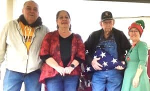 The Alexandria Christmas parade delighted holiday lovers of all ages Saturday afternoon. This year’s grand marshals were three veterans (pictured left to right): Air Force Sergeant Michael Stranathan, his wife Army Sergeant Dora Stranathan, and 92 year old Billy McClanahan, who served as a US Army Private First Class in the Korean War, greeted by Alexandria Mayor Beth Tripp