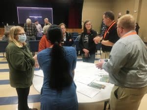 Prior to the hearing on the Jones Brothers quarry water discharge permit application Tuesday night, the state had information tables set up around the auditorium where staff showed plans and took questions from the public about the project.