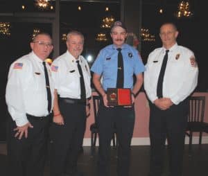 Smithville Firefighter Dalton Roberts received the “Robert Eller Award” Thursday night for attending the most incidents, trainings, workings, and events as a career (paid) firefighter in 2024. Pictured left to right: Captain Donnie Cantrell, Chief Charlie Parker, Dalton Roberts, and Deputy Chief Jeff Wright