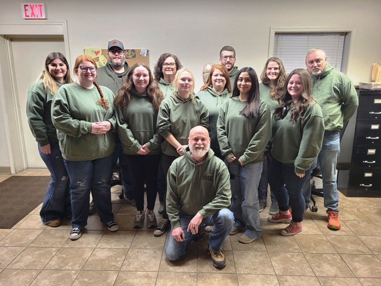 DeKalb Emergency Communications (E-911 Staff): Back Row L to R: Kim Atnip- Administrative Assistant, Daniel Magness, Stephanie Brown, Caleb Haggard- Supervisor, Shelly Brassel, Tony Thomas- Supervisor. Middle Row L to R: Erika Brown, Rainey Tiner, Leah Clark, Chrystal Reed, Cassandra Garcia, Bailey Redmon. Kneeling: Director Brad Mullinax