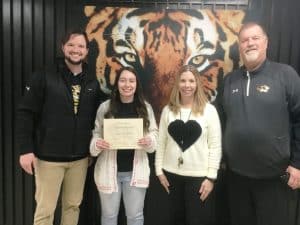 Maddison Richardson Awarded DCHS Teacher of the Month for January. Pictured left to right: DCHS Assistant Principal Seth Willoughby, Maddison Richardson, DCHS Assistant Principal Jenny Norris, and DCHS Principal Bruce Curtis