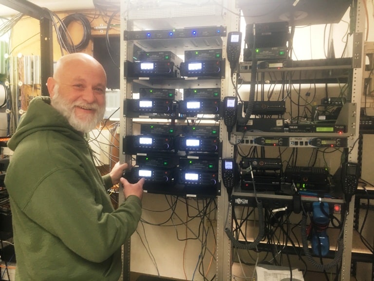 911 Director Brad Mullinax showing off the new emergency radio communications equipment at the central dispatch headquarters on South Mountain Street